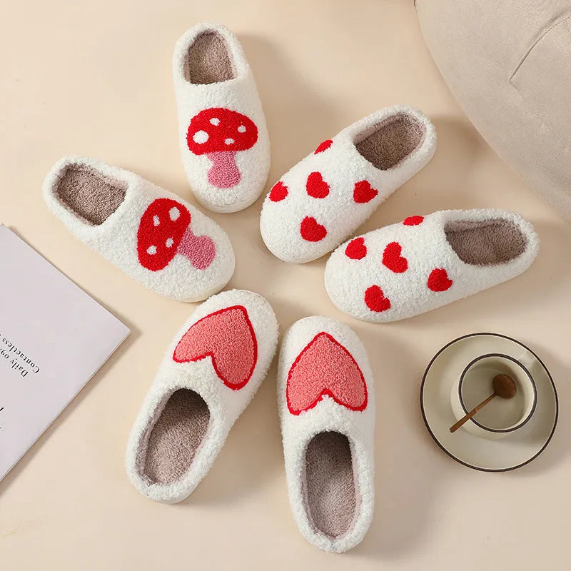 Women's plush home slippers with cartoon love design, round toe, and non-slip PVC sole