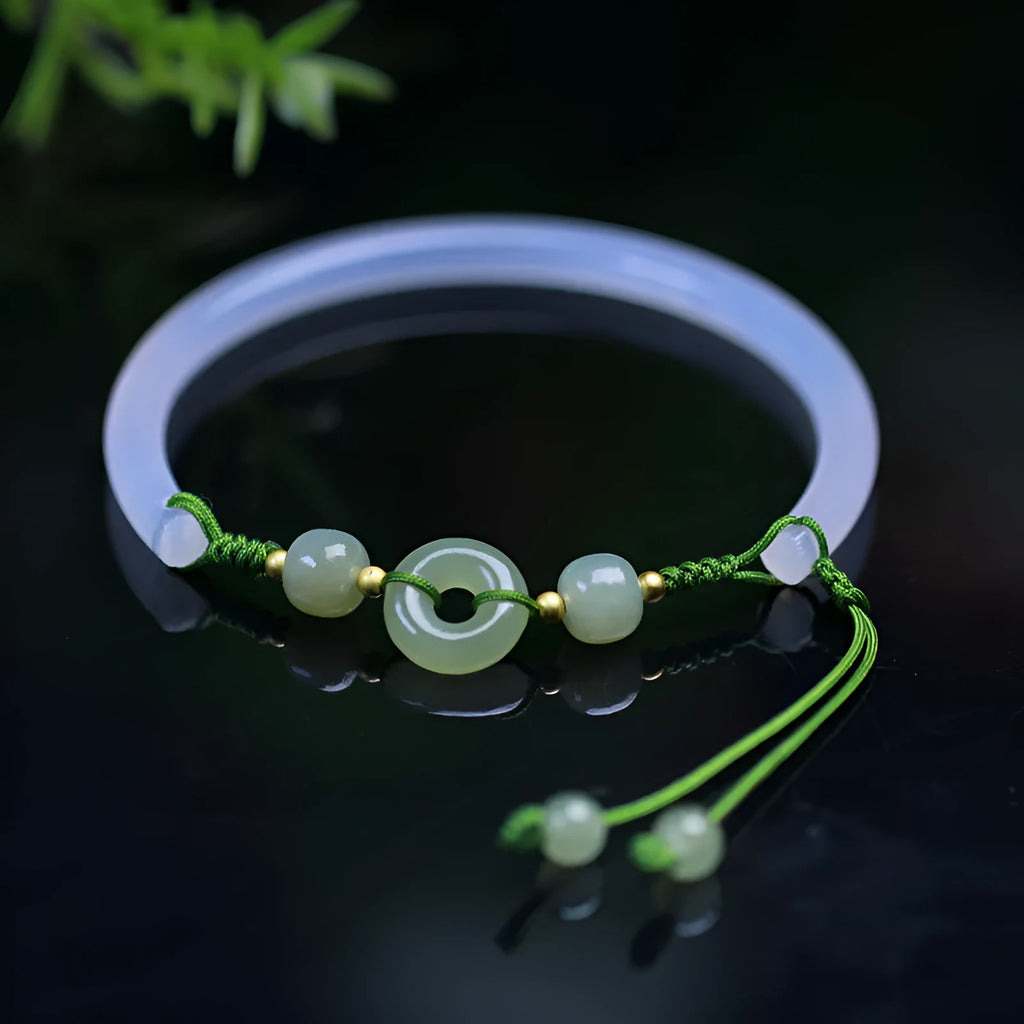 Hand-woven half bracelet with white agate and hetian jade beads and a peace buckle.
