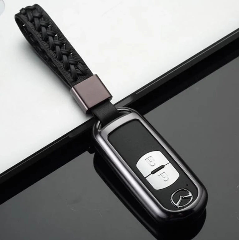 Aluminum alloy key case for Mazda with CNC engraving, available in multiple colors