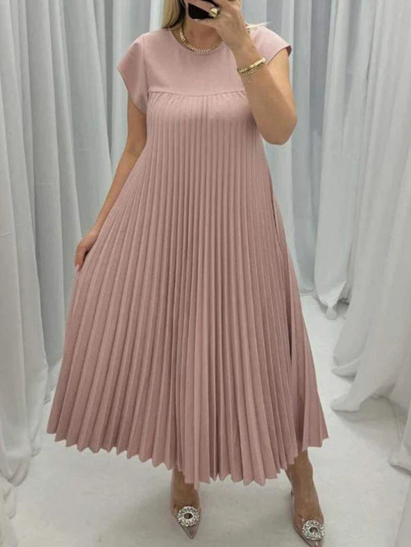 Women's summer pleated long dress in various colours, showcasing the unique design and flattering silhouette.