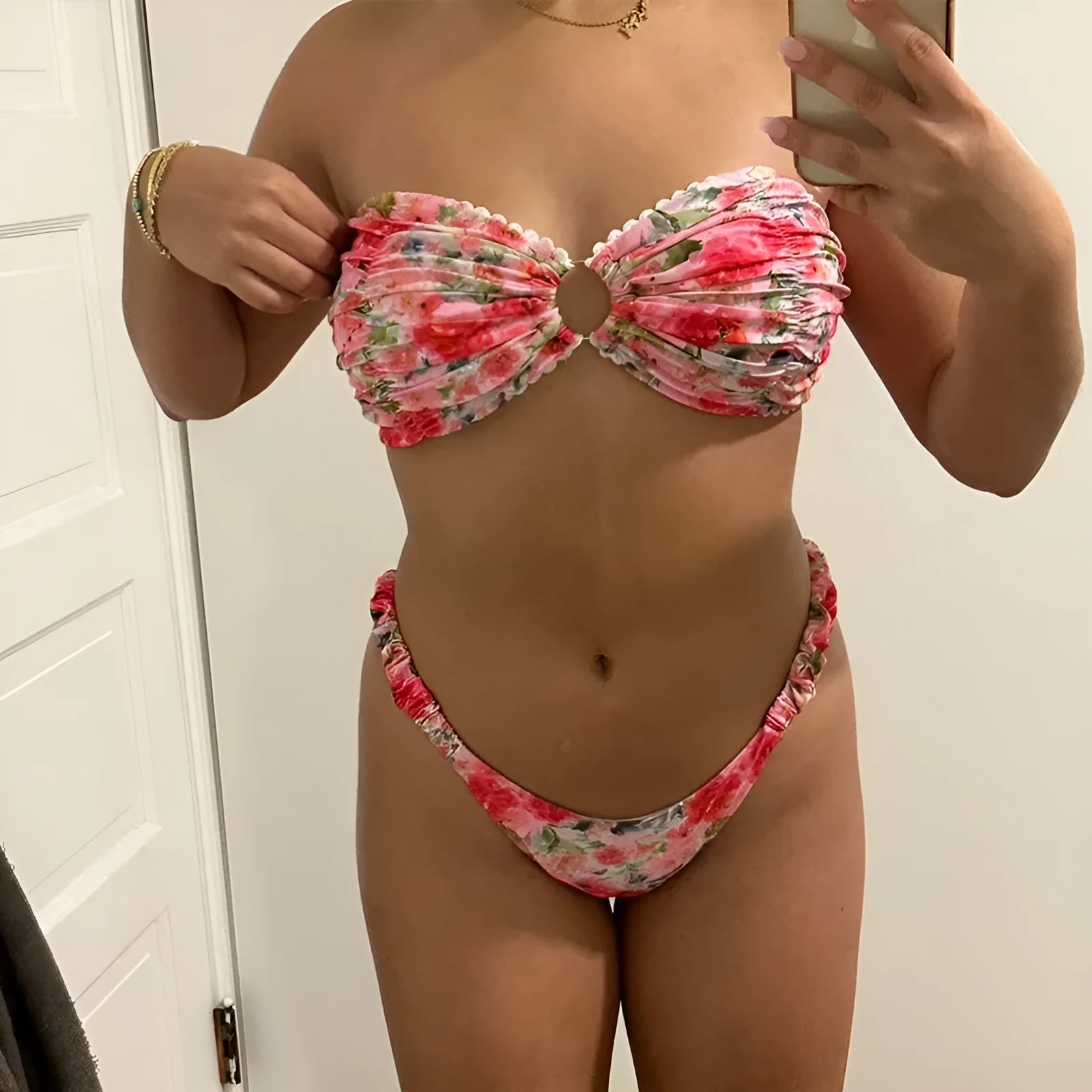 Blue floral print women's bikini set with lace trim on sleeveless tube top and matching briefs.