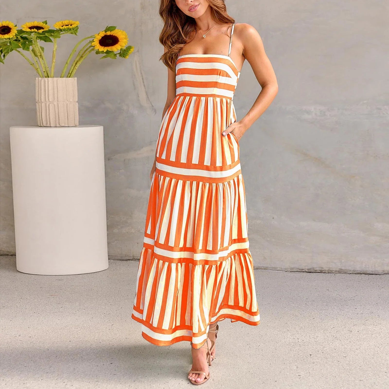 Stylish backless striped dress with square neckline, perfect for beach vacations