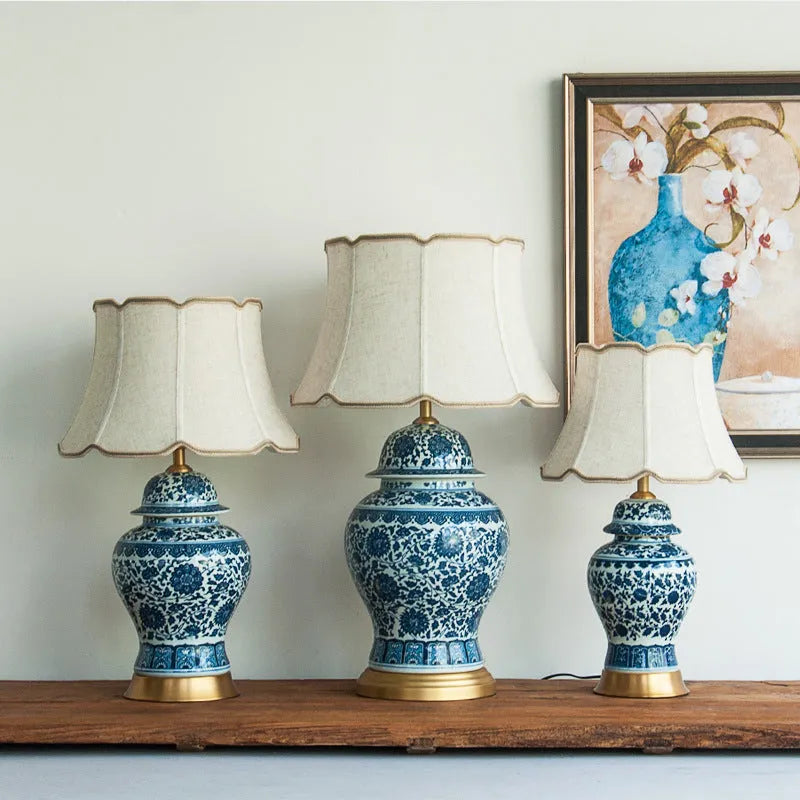 Blue and white Chinese porcelain table lamp with handmade cloth shade on copper base