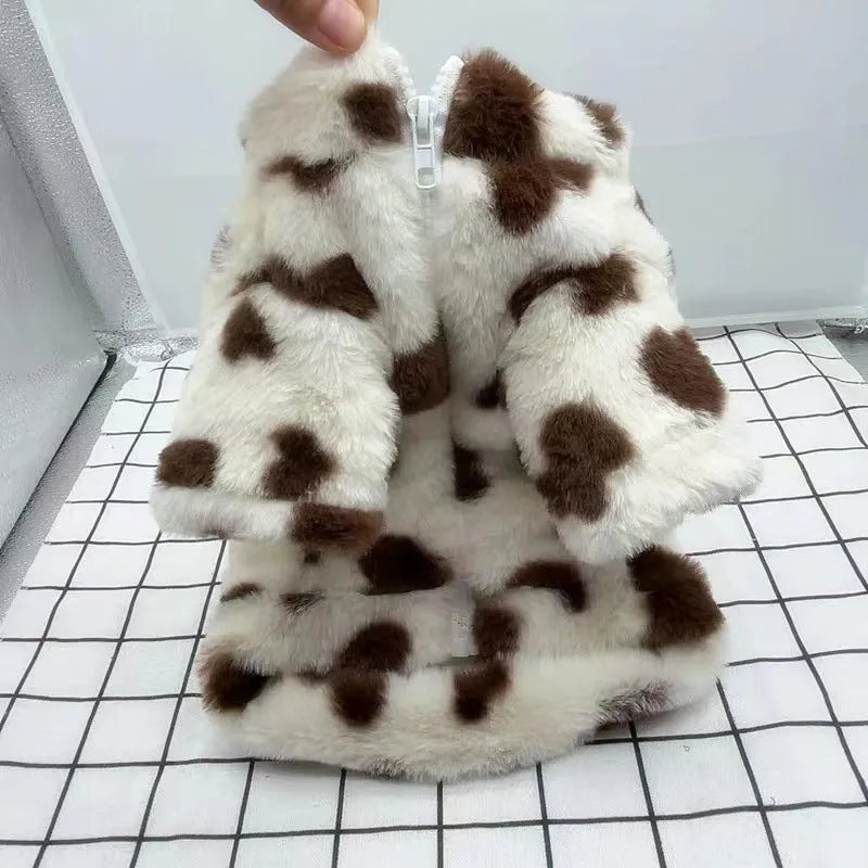 Small dog wearing pink plush winter coat for teddy, bichon or pomeranian breeds