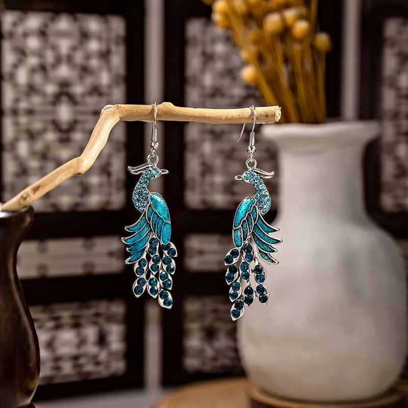 Cloisonne peacock earrings with Miao silver phoenix totem in gold electroplated finish