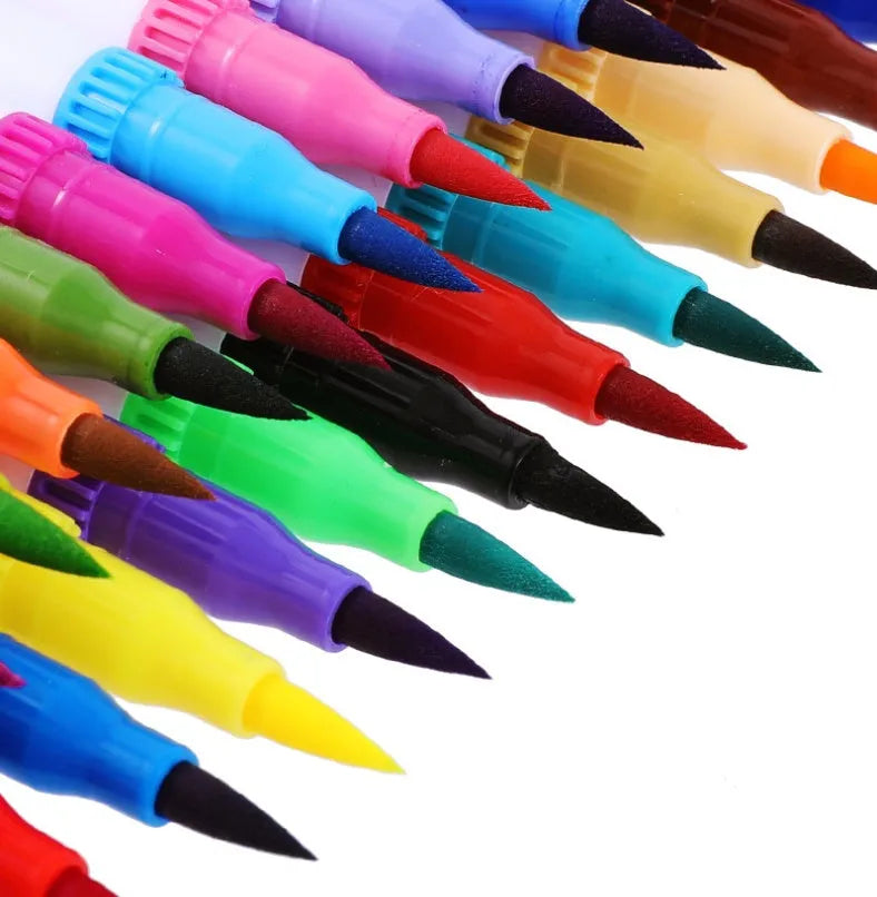 Set of artist watercolour pens with brush tips arranged by colour, showcasing vivid inks.