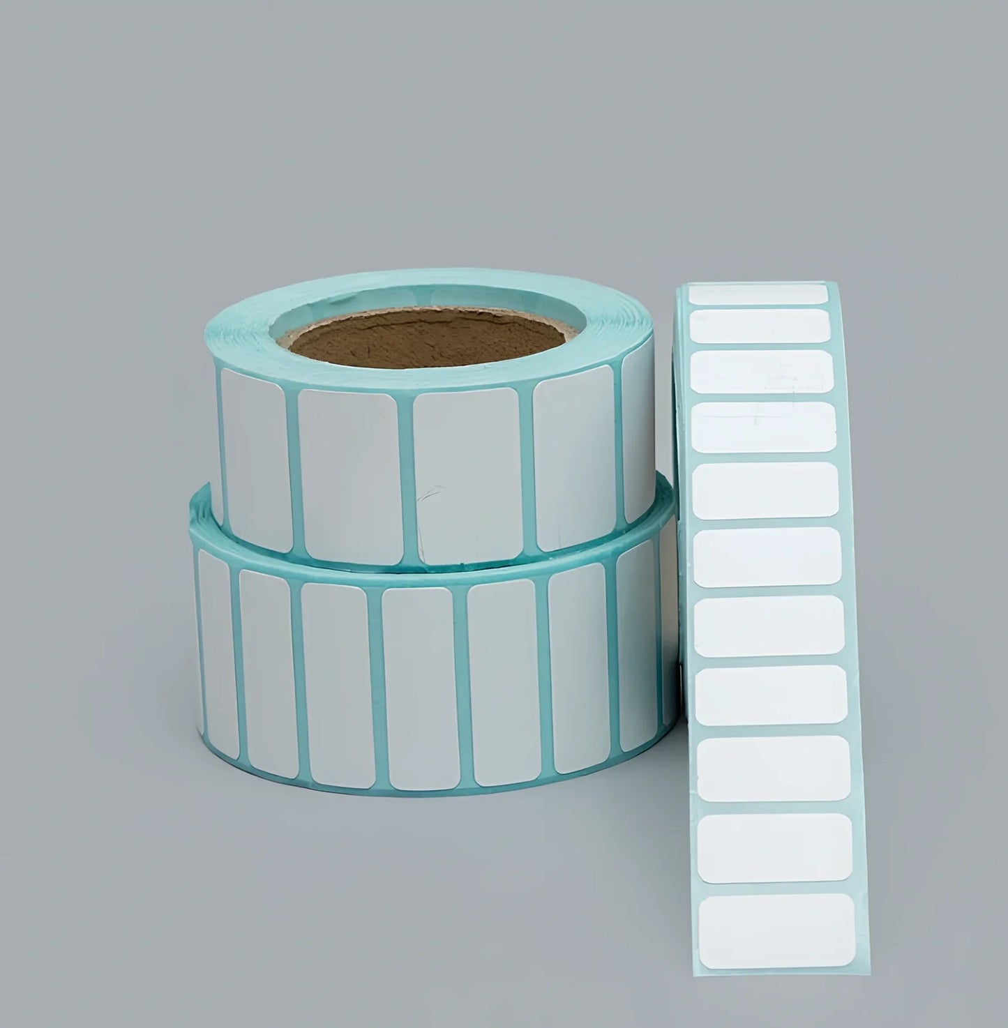 Roll of 20mm x 10mm black and blue waterproof sticky stickers, 3000 sheets on 28mm core, scratch and oil resistant