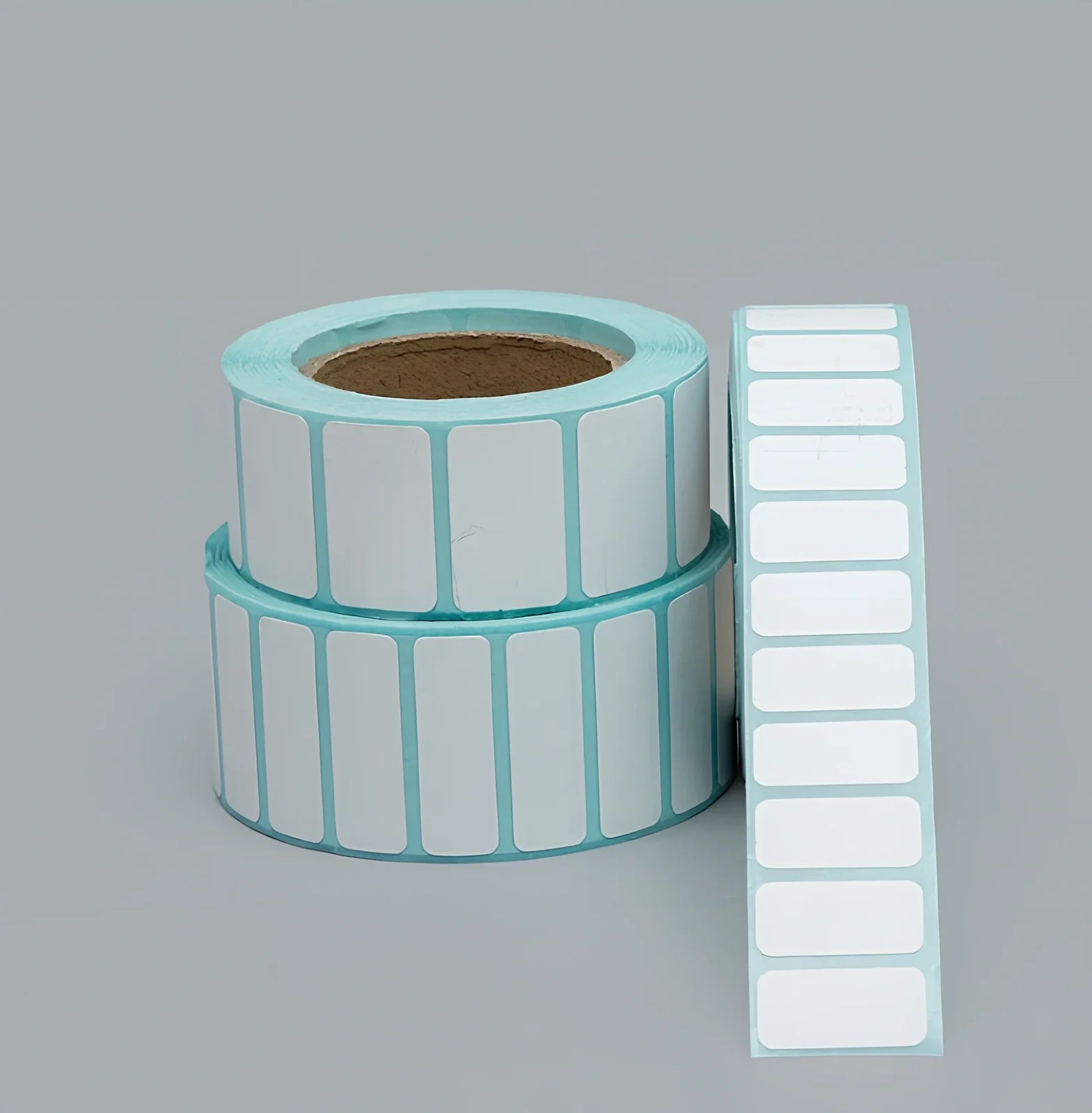 Roll of 20mm x 10mm black and blue waterproof sticky stickers, 3000 sheets on 28mm core, scratch and oil resistant