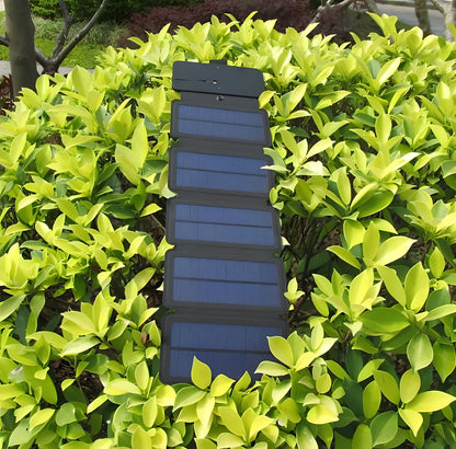 8W folding solar charger with expanded monocrystalline panel showing USB output port