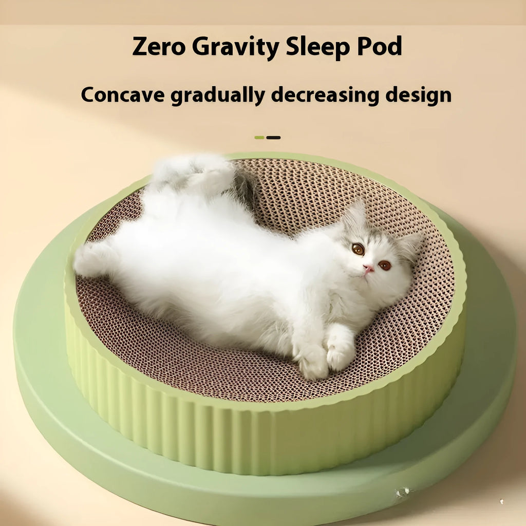 A round green cat scratching board made of corrugated cardboard, 55cm across, with two spare refills.