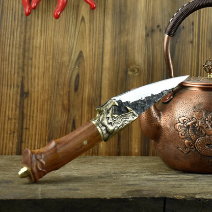 Hand-forged slicing knife with rosewood handle and leather case