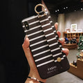 Samsung Galaxy phone case with a flip-out kickstand bracket on the back, shown in a simple TPU design.