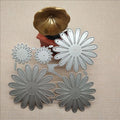 Silver high carbon steel cutting mold with etched flower decoration measuring 12.5x13 cm