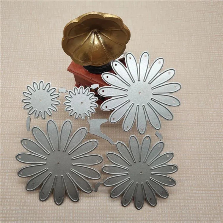 Silver high carbon steel cutting mold with etched flower decoration measuring 12.5x13 cm
