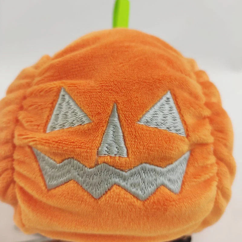 Reversible Halloween plush toy that can flip between a friendly ghost and playful pumpkin design