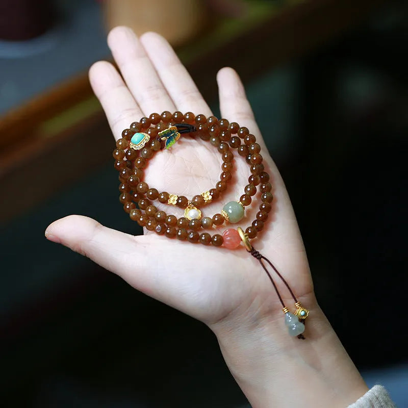 Brown jade Hetian jade three-ring bracelet with silver butterfly and gourd charms