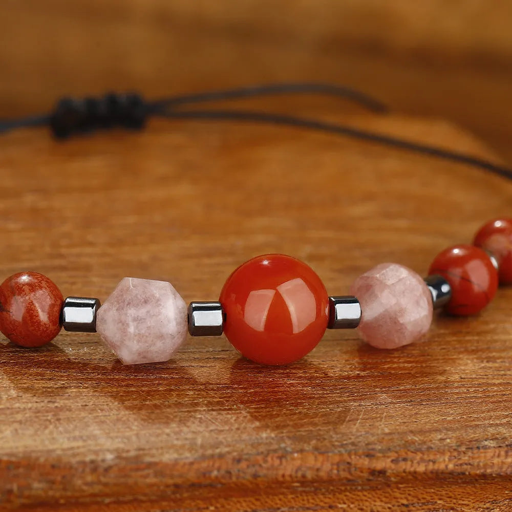 Red manual beaded bracelet with sunstone, redstone and copper geometric beads
