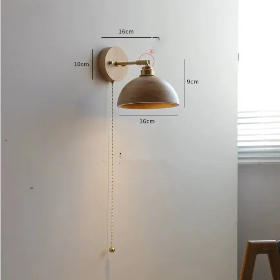 Nordic style wooden wall mounted bedside lamp in a bedroom setting