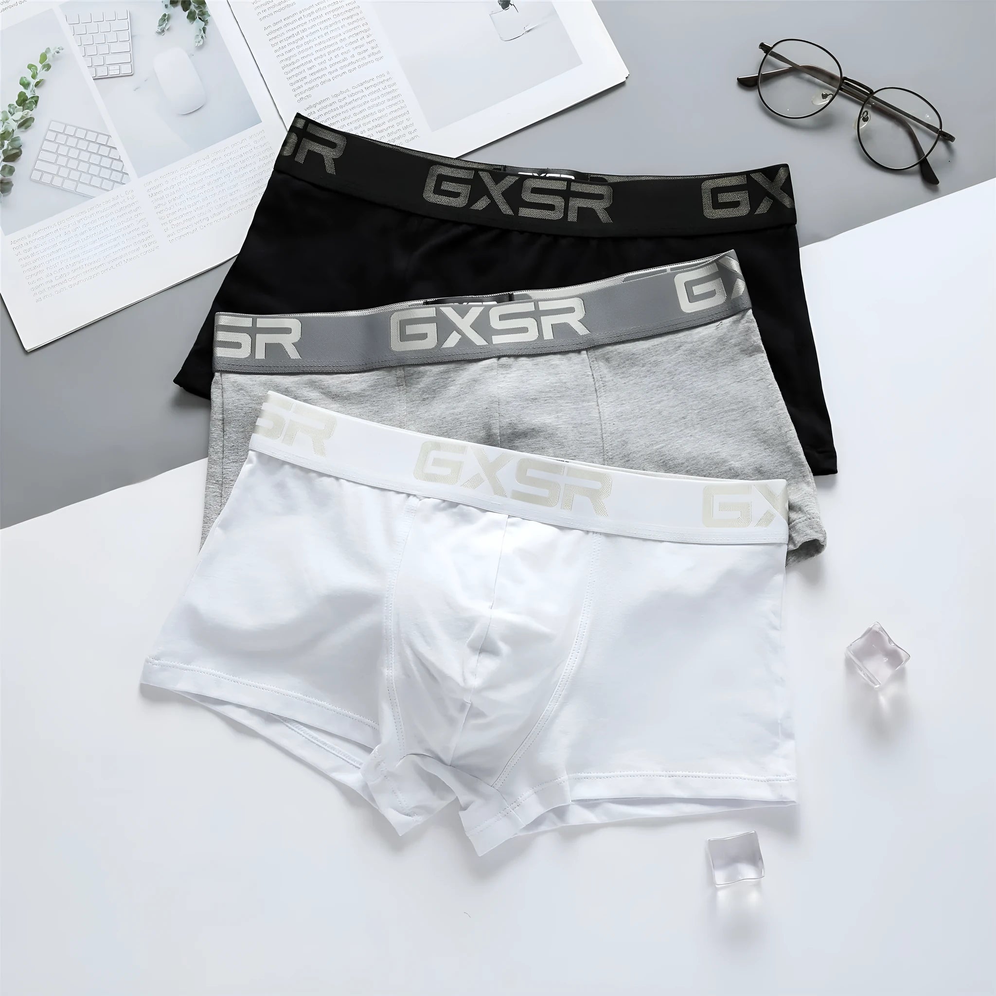 Men's purified cotton low waist boxers in solid colour, knitted fabric, black/white/gray options, sizes M-XXL