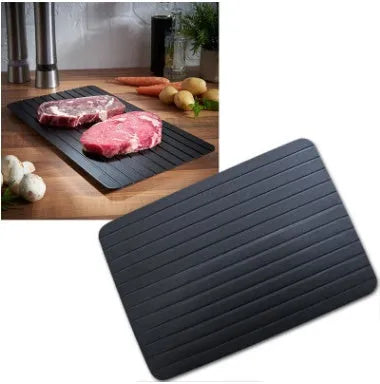 Black aluminium kitchen defrosting tray for thawing frozen food without electricity