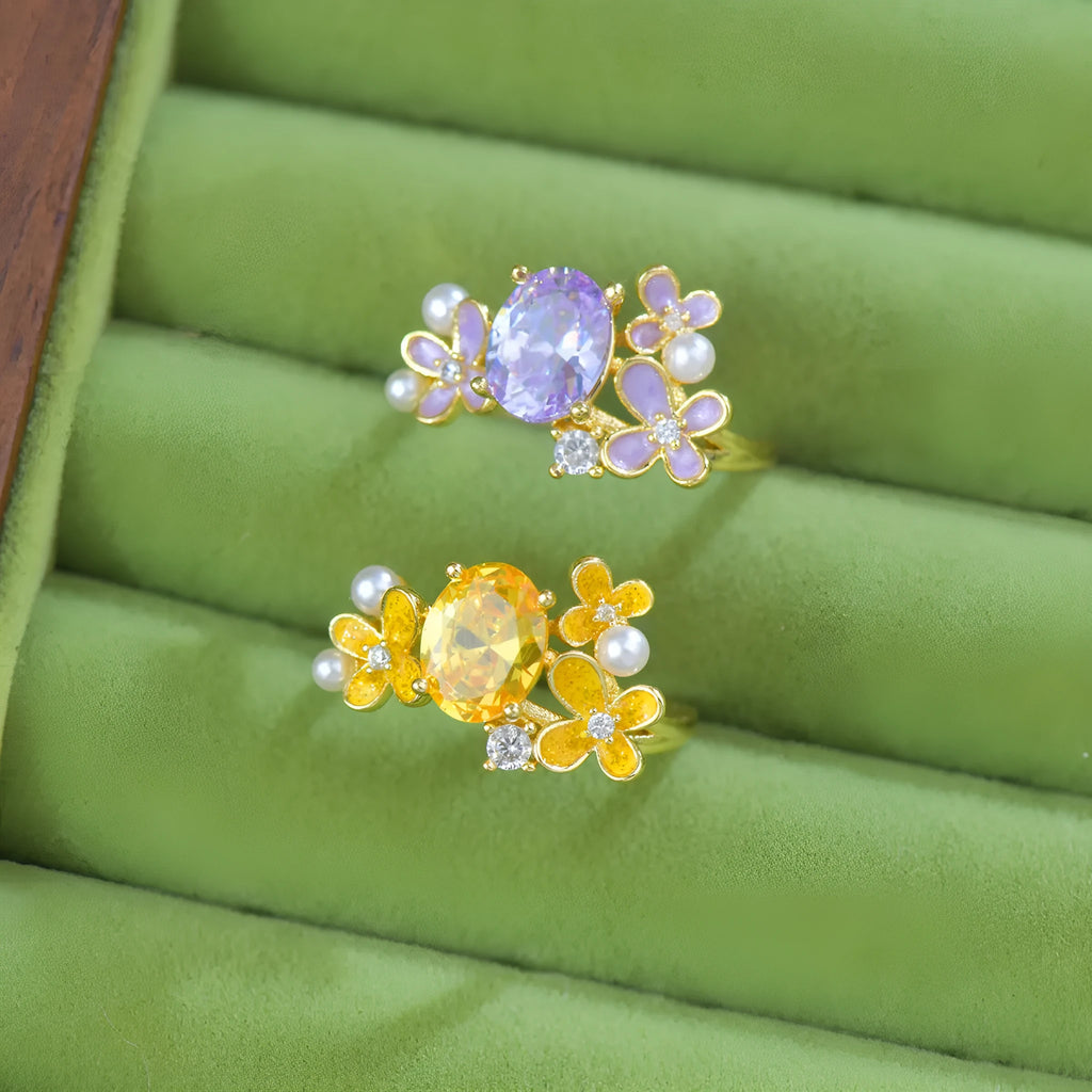 Women's open ring with flower design and zircon detail in light purple or yellow colour options