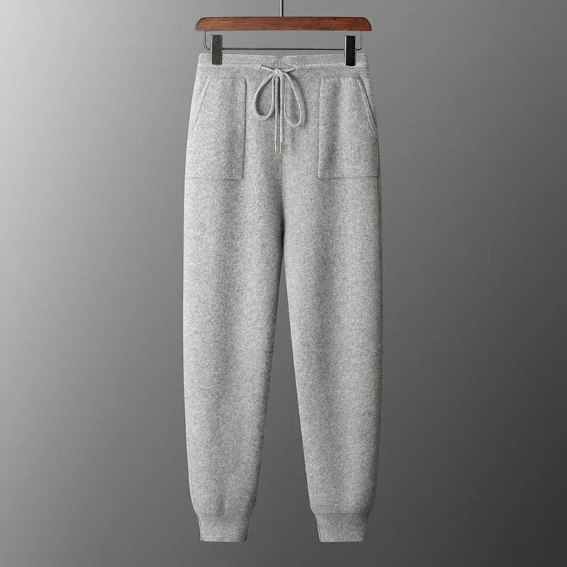 Men's light grey hooded knitted sweatshirt and matching trousers casual winter set.
