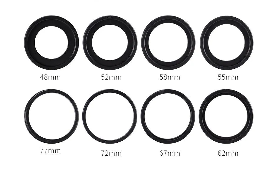Traveller RF-550D macro ring flash with 48 LEDs, LCD display, and eight adapter rings 49-77mm on black background