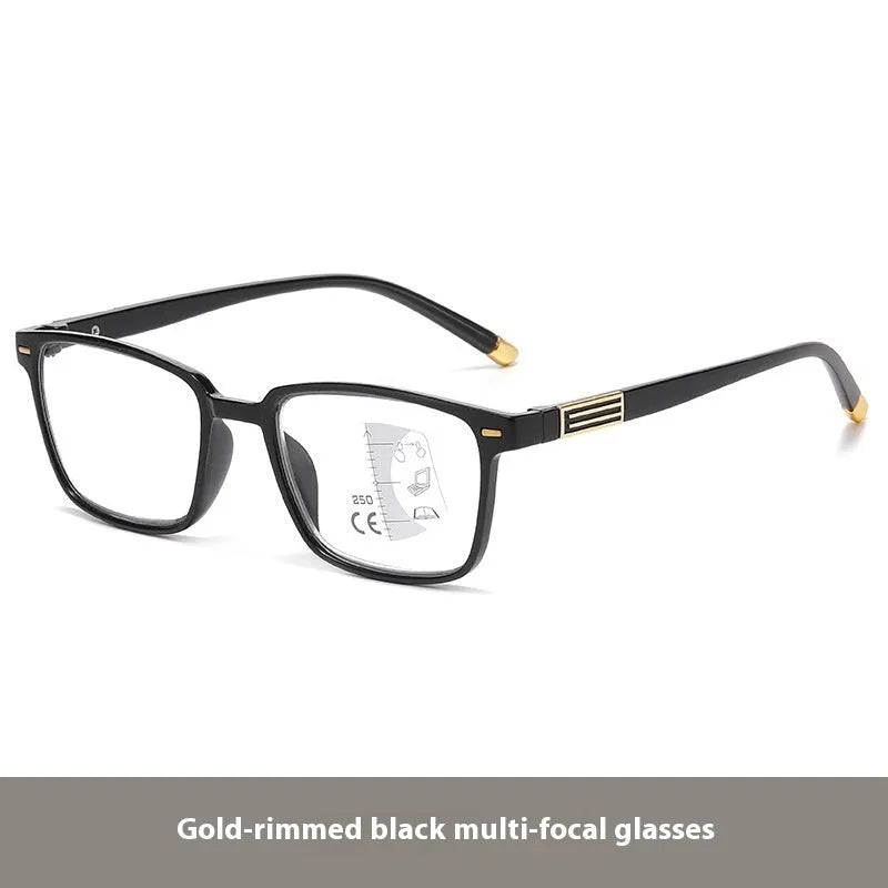 A pair of multifocal reading glasses with colour changing, anti blue light PC lenses in a black and silver frame style.