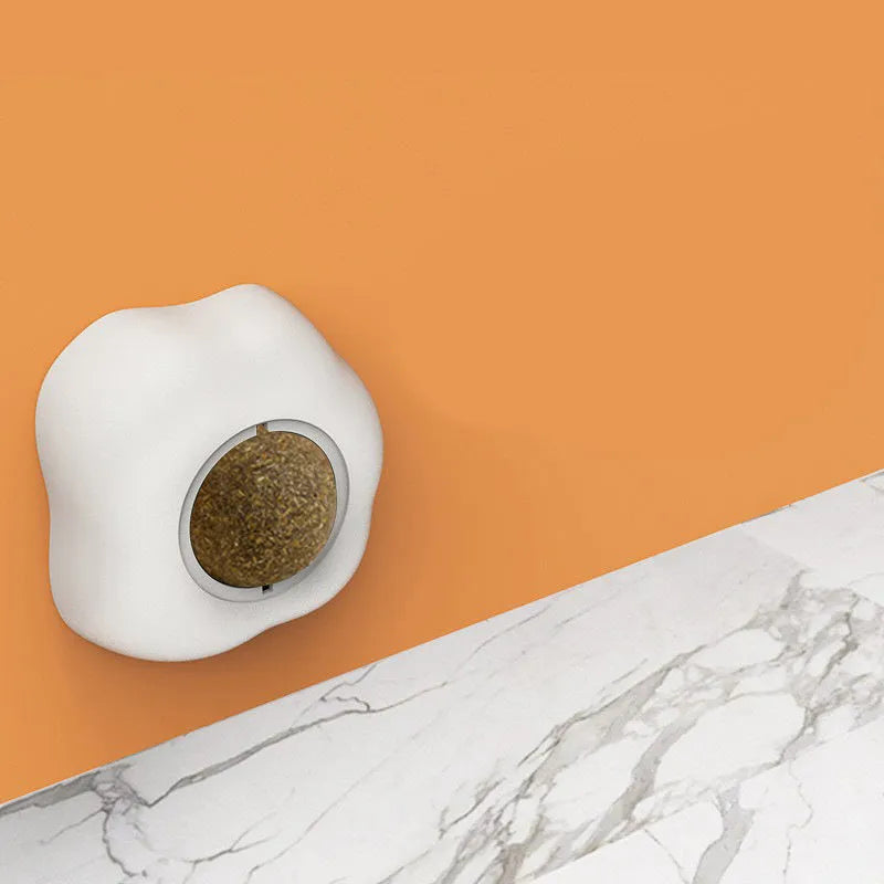 Interactive catnip ball toy for cats in fried egg and poached egg shapes with wall mount feature