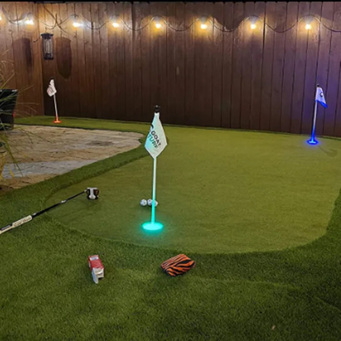 LED ball hole light with transparent shell and screwdriver on golf hole