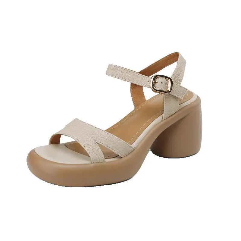 Women's apricot open toe platform sandals with an adjustable strap on a white background.