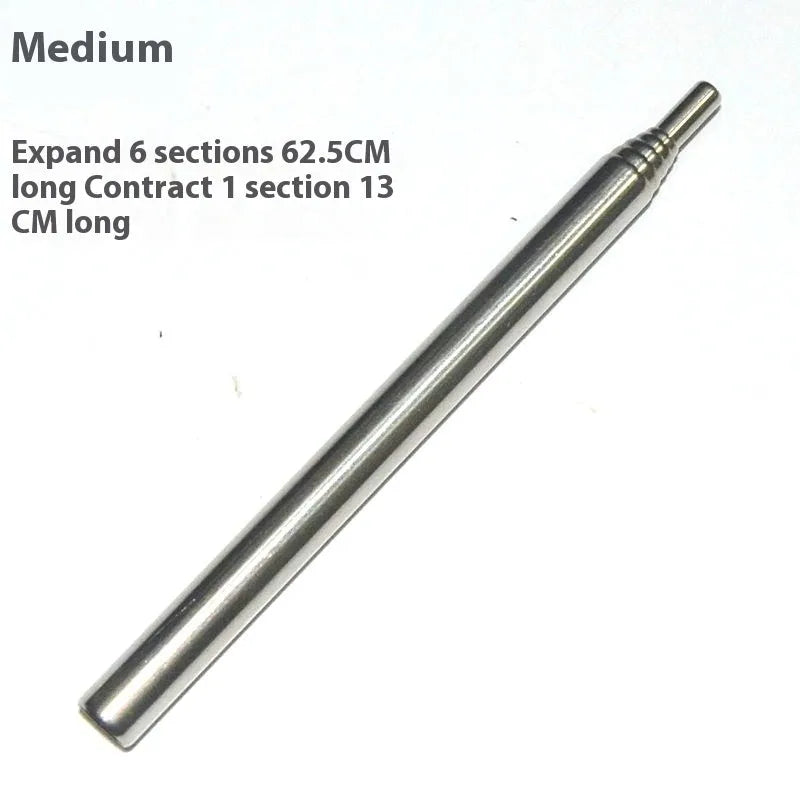 Stainless steel outdoor fire blowing stick on a picnic table with camping gear