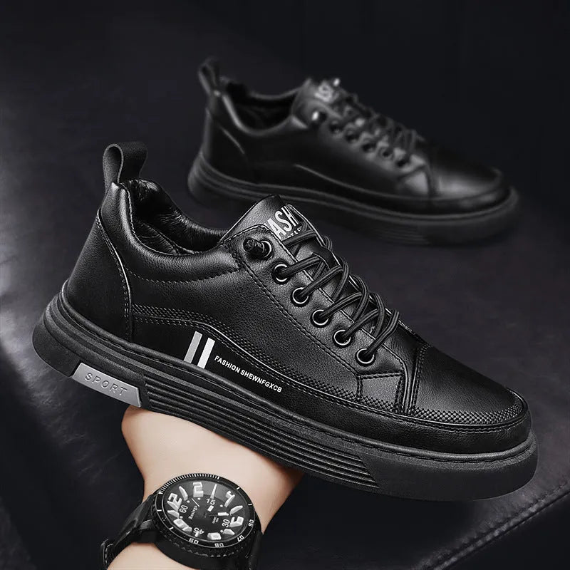 Men's low-top black and white skateboard shoes with elastic band closure and rubber sole