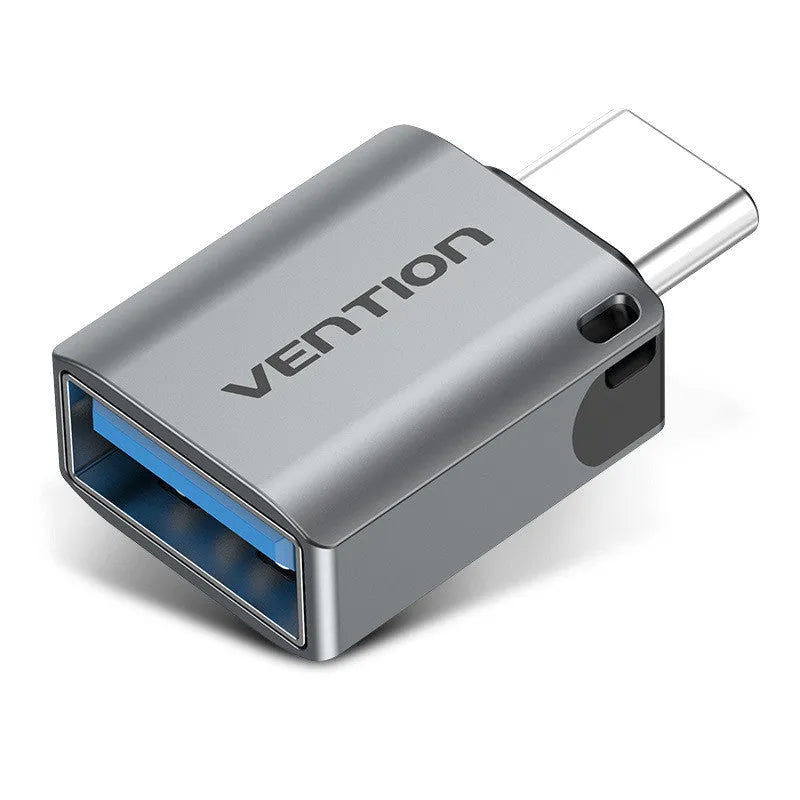 Grey aluminium alloy USB-C male to USB-A female OTG adapter with a black lanyard attached.