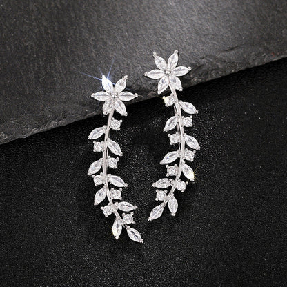 Floral diamond earrings for women in white gold, gold, and rose gold finishes