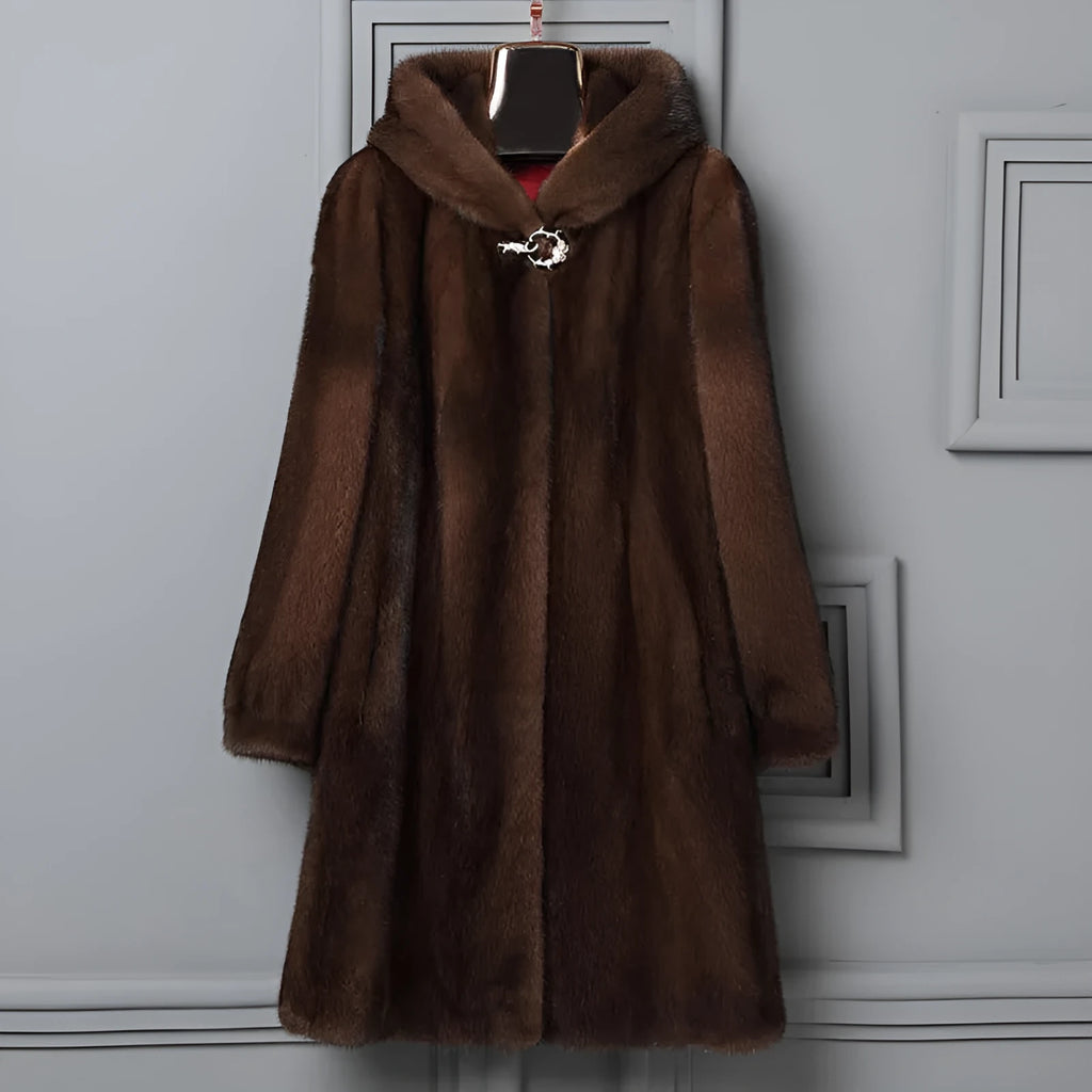 Women's long black faux fur hooded coat for winter street fashion wear.