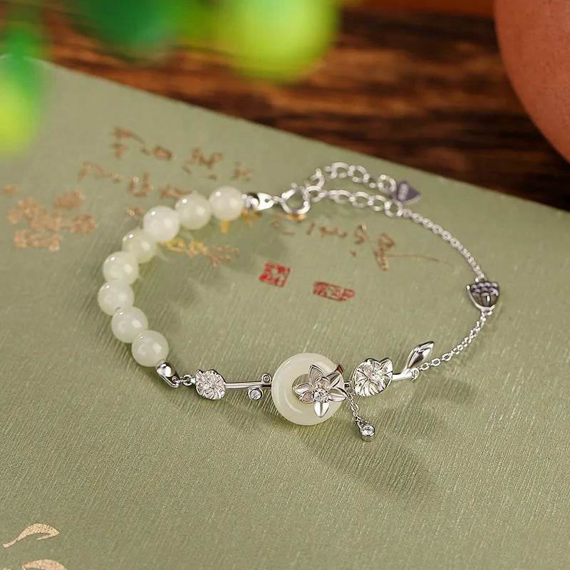 Women's Hetian jade and 925 silver peace buckle bracelet with lotus motif
