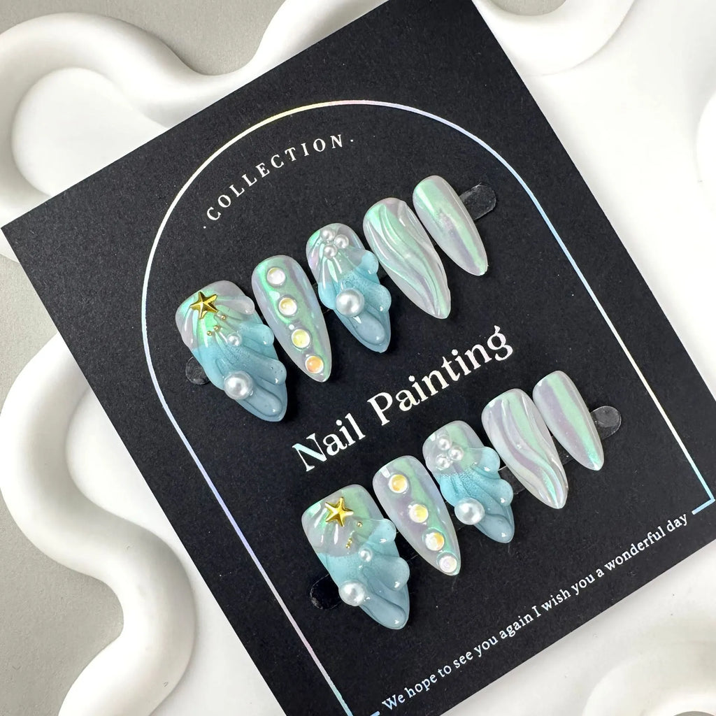 Blue plastic shell-shaped artificial nail stickers in four sizes XS S M L