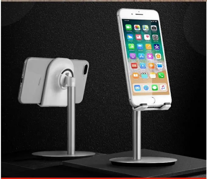Silver metal computer phone holder on desktop with tablet showing 3-11 inch compatibility