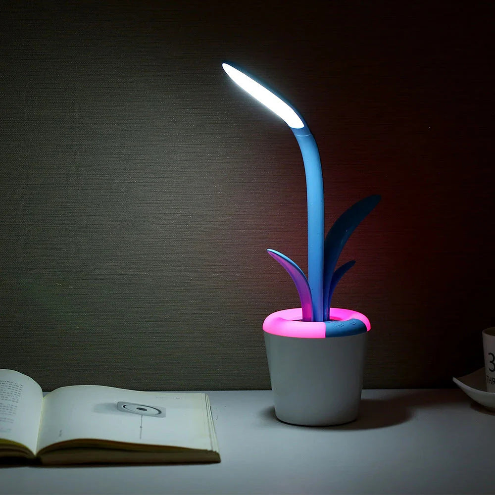 Rechargeable USB LED desk lamp with adjustable brightness levels, night light mode, and a stylish plant-inspired design