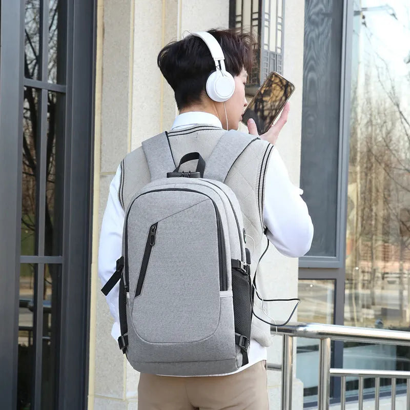 Oxford cloth computer backpack in blue colour showing street trend style with dimensions 50x19x31cm