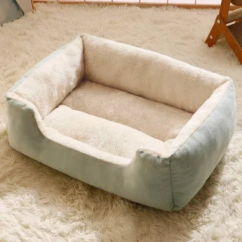 Short plush cat bed for pets shown in one of five colours and available in five sizes.