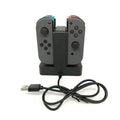 Black dual controller charging cradle with USB interface for left and right game handles