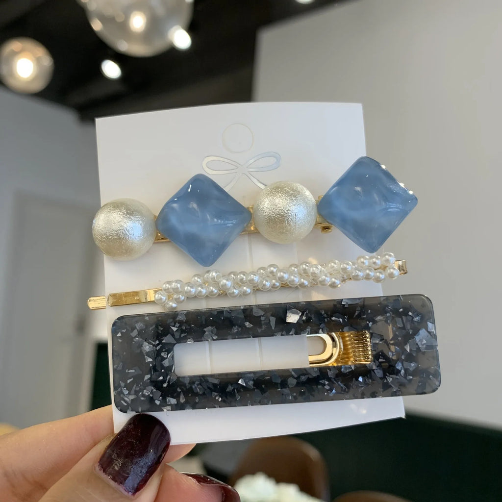 Acrylic pearl hair clip set in various colours including blue, green, pink, purple, white, and yellow