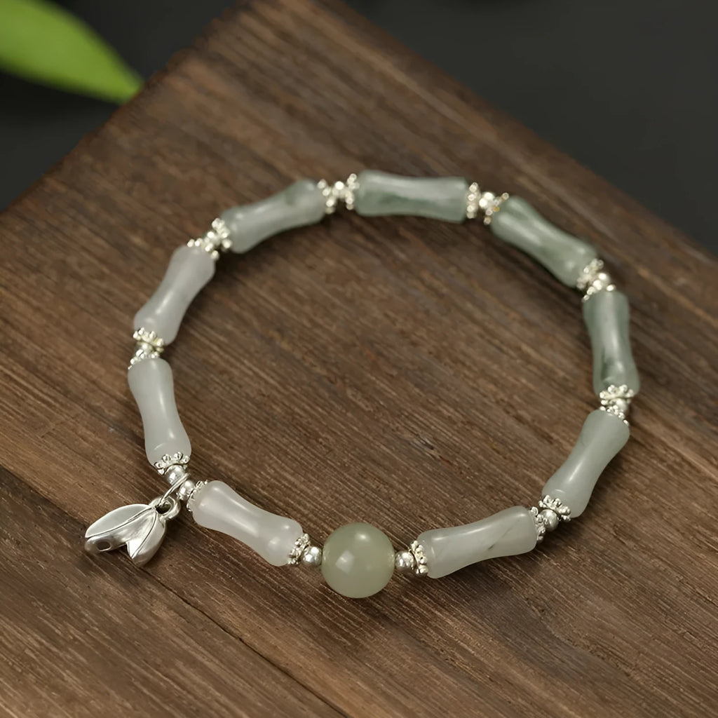 Women's antique-style bracelet made from Tianshan green bamboo and sterling silver with bamboo joint detailing.