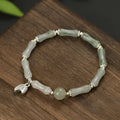 Women's antique-style bracelet made from Tianshan green bamboo and sterling silver with bamboo joint detailing.