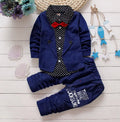 Blue children's casual sport suit tracksuit set with short sleeve top and elastic waist shorts on a hanger.