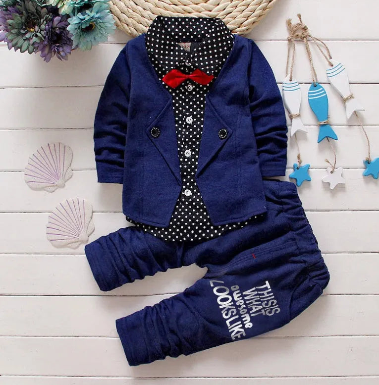 Blue children's casual sport suit tracksuit set with short sleeve top and elastic waist shorts on a hanger.