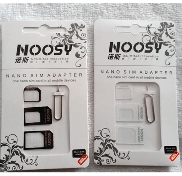 Three black and white plastic SIM card holders for memory chip storage.