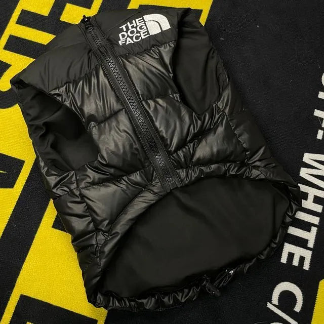 Thick warm down vest for dogs in black, showing side view, sizes S to XXL